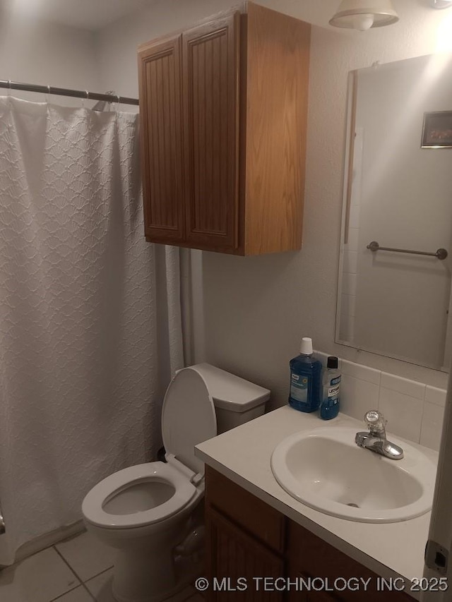 200 Ogeechee, Ramona, OK 74061 - bathroom with vanity, curtained shower, and tile patterned floors