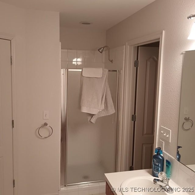 200 Ogeechee, Ramona, OK 74061 - full bathroom featuring a stall shower and vanity
