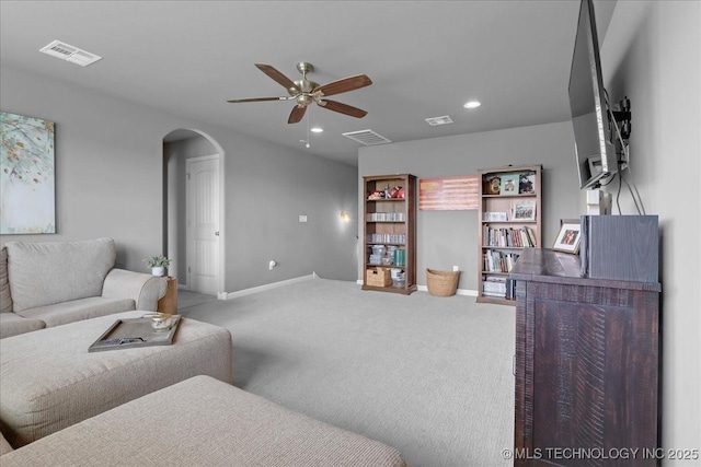 30130 S Maxine Ave, Inola, OK 74036 - living area featuring ceiling fan, arched walkways, carpet flooring, and recessed lighting