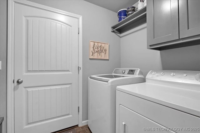 30130 S Maxine Ave, Inola, OK 74036 - washroom featuring separate washer and dryer, cabinet space, and dark wood-type flooring