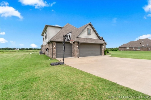 30130 S Maxine Ave, Inola, OK 74036 - view of property exterior with brick siding, a lawn, driveway, a shingled roof, and a garage