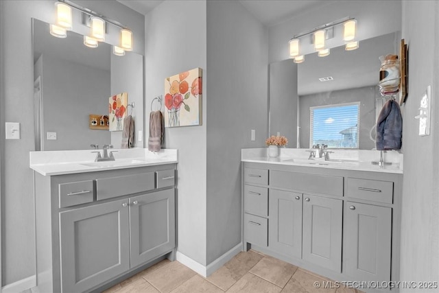 30130 S Maxine Ave, Inola, OK 74036 - full bathroom featuring two vanities and tile patterned flooring