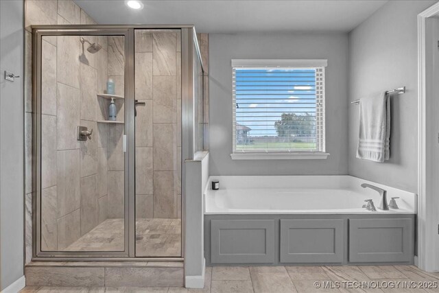 30130 S Maxine Ave, Inola, OK 74036 - full bathroom with a garden tub, a stall shower, and recessed lighting