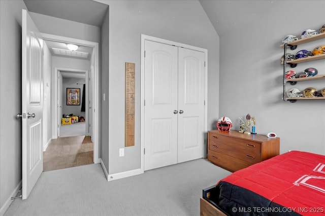 30130 S Maxine Ave, Inola, OK 74036 - bedroom featuring a closet, carpet flooring, and lofted ceiling