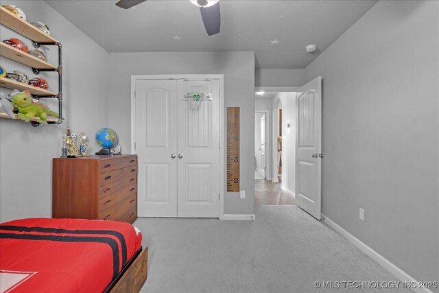 30130 S Maxine Ave, Inola, OK 74036 - carpeted bedroom featuring a closet and a ceiling fan