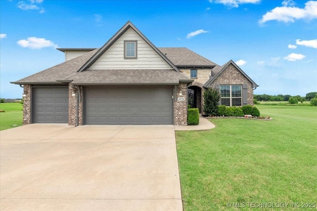 30130 S Maxine Ave, Inola, OK 74036 - view of front of home featuring brick siding, an attached garage, roof with shingles, and a front yard