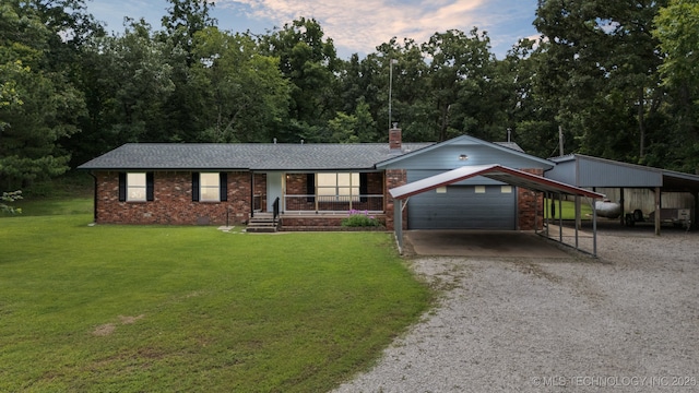 20512 E 430th Rd, Claremore, OK 74017 - ranch-style home featuring gravel driveway, a front yard, covered porch, a garage, and brick siding