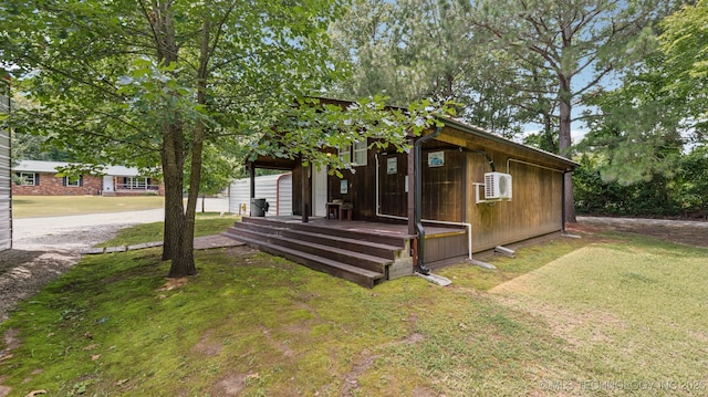 20512 E 430th Rd, Claremore, OK 74017 - view of front of home featuring a front yard and a wall mounted AC