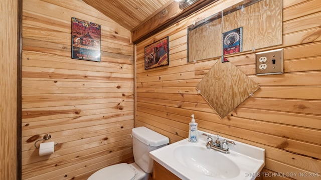 20512 E 430th Rd, Claremore, OK 74017 - half bath with wooden ceiling, wooden walls, lofted ceiling, and vanity