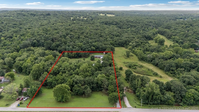 20512 E 430th Rd, Claremore, OK 74017 - aerial view of property's location with a heavily wooded area and property parcel outlined