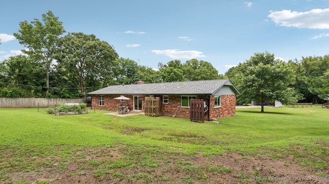 20512 E 430th Rd, Claremore, OK 74017 - rear view of property featuring a patio, a chimney, view of scattered trees, and brick siding