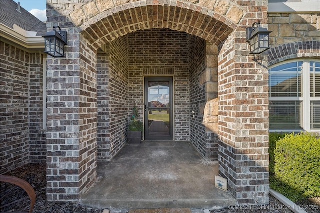 5983 E 137th St, Collinsville, OK 74021 - property entrance featuring brick siding