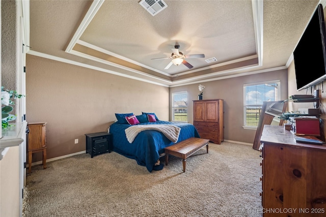 5983 E 137th St, Collinsville, OK 74021 - bedroom featuring a tray ceiling, a textured ceiling, ornamental molding, light carpet, and a ceiling fan