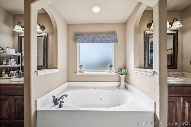 5983 E 137th St, Collinsville, OK 74021 - bathroom featuring vanity and a jetted tub