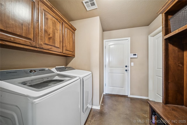 5983 E 137th St, Collinsville, OK 74021 - washroom featuring washer and dryer, cabinet space, and a textured ceiling