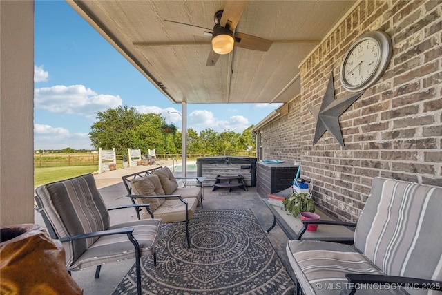 5983 E 137th St, Collinsville, OK 74021 - view of patio featuring a ceiling fan and outdoor lounge area
