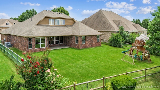 4204 N Maple Pl, Broken Arrow, OK 74012 - back of property featuring a playground, a fenced backyard, and brick siding