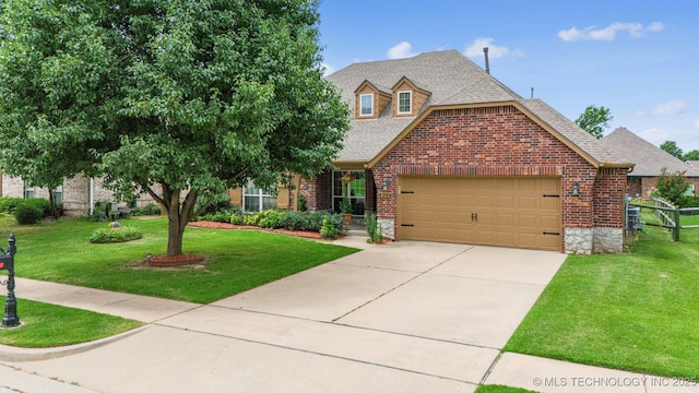 4204 N Maple Pl, Broken Arrow, OK 74012 - view of front of home with an attached garage, concrete driveway, roof with shingles, and brick siding