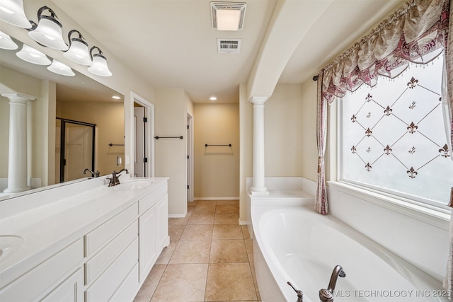 4204 N Maple Pl, Broken Arrow, OK 74012 - full bathroom with a bath, double vanity, a stall shower, decorative columns, and tile patterned floors