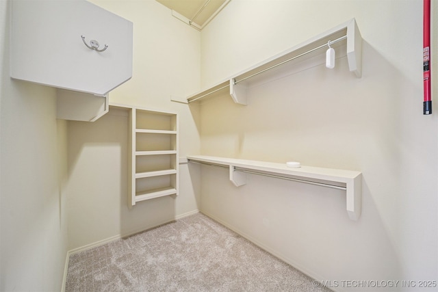 4204 N Maple Pl, Broken Arrow, OK 74012 - spacious closet featuring carpet flooring