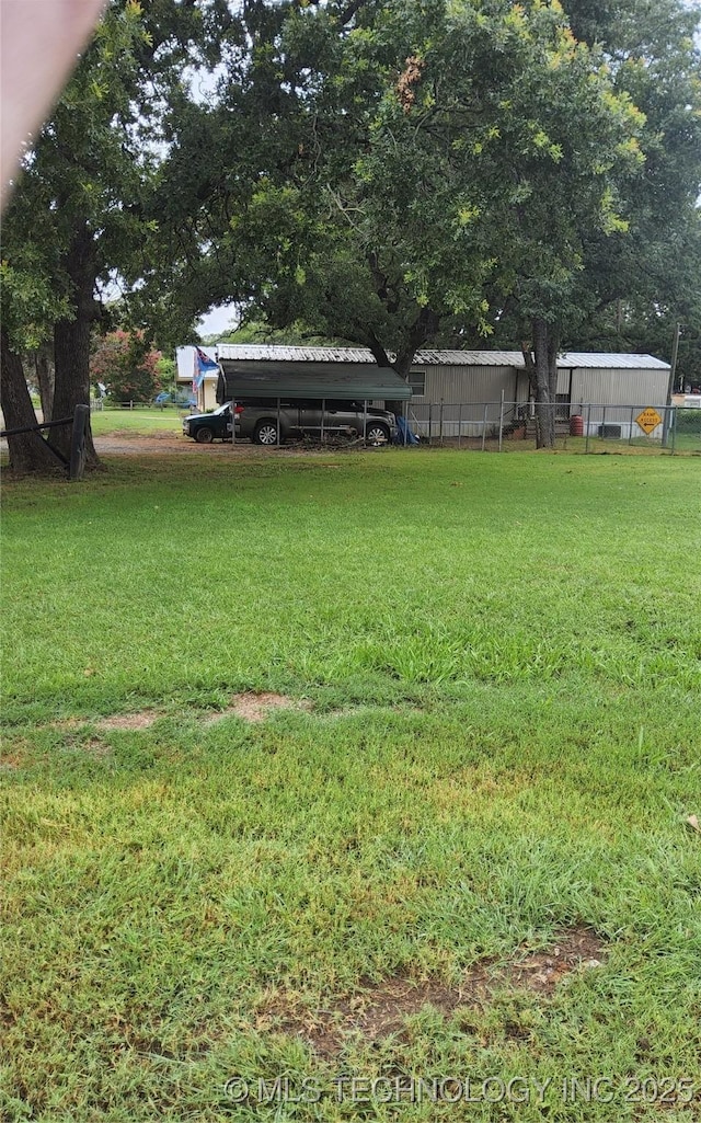 22 Quail Dr, Durant, OK 74701 - view of yard featuring a detached carport