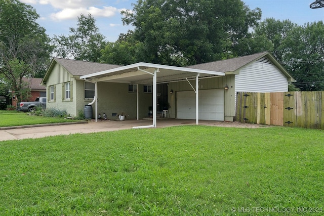 5718 E 27th St, Tulsa, OK 74114 - rear view of property featuring a garage, a shingled roof, and brick siding