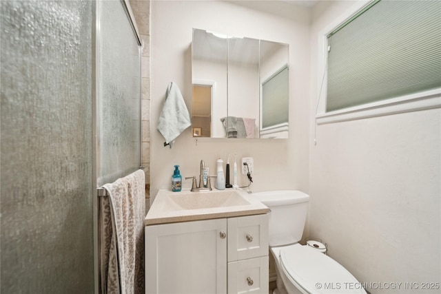 5718 E 27th St, Tulsa, OK 74114 - bathroom featuring vanity and a shower stall