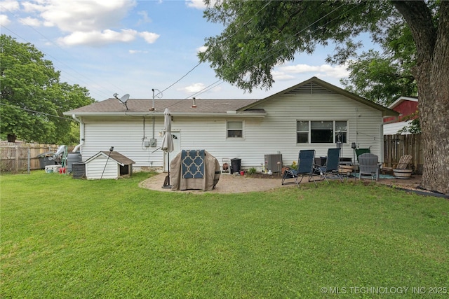 5718 E 27th St, Tulsa, OK 74114 - rear view of property with roof with shingles