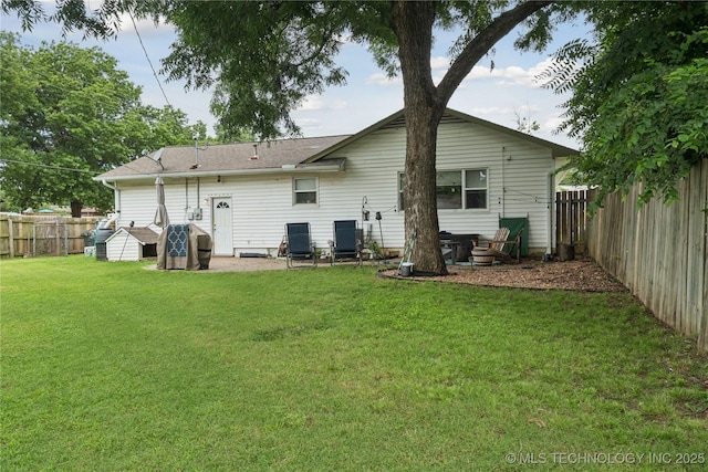 5718 E 27th St, Tulsa, OK 74114 - rear view of property featuring a fenced backyard