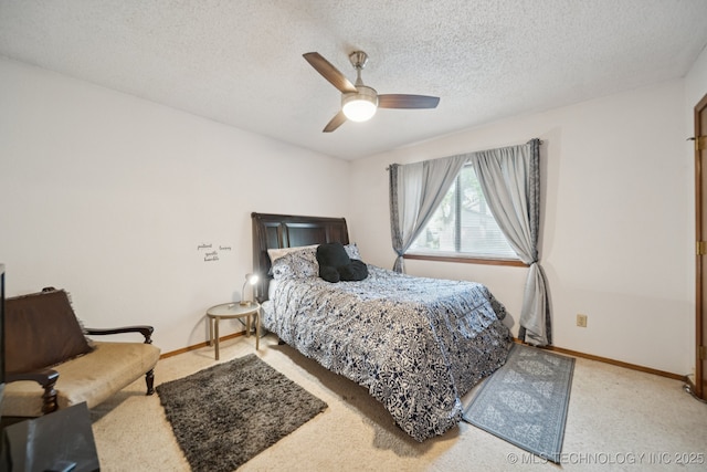 1234 S 110th E Ave Unit 59-4A, Tulsa, OK 74128 - carpeted bedroom featuring a ceiling fan and a textured ceiling