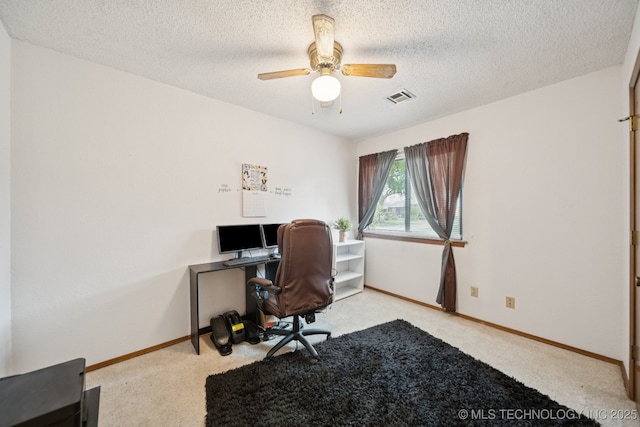 1234 S 110th E Ave Unit 59-4A, Tulsa, OK 74128 - office space with carpet floors, a ceiling fan, and a textured ceiling
