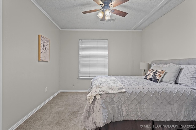 1015 NW Maxwell, Ardmore, OK 73401 - carpeted bedroom with a textured ceiling, a ceiling fan, and crown molding