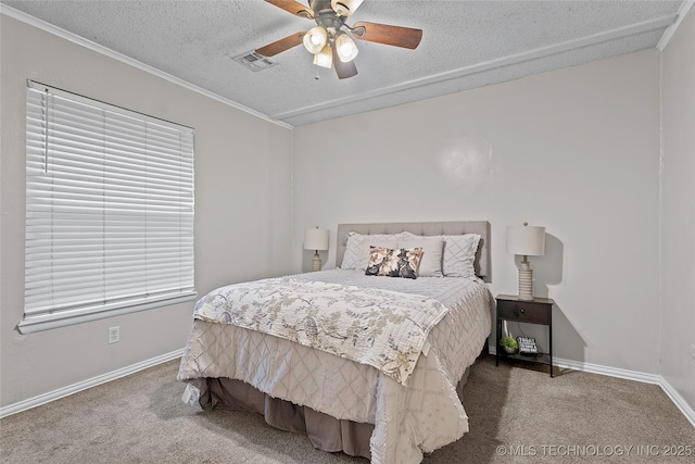 1015 NW Maxwell, Ardmore, OK 73401 - carpeted bedroom with a textured ceiling, a ceiling fan, and crown molding
