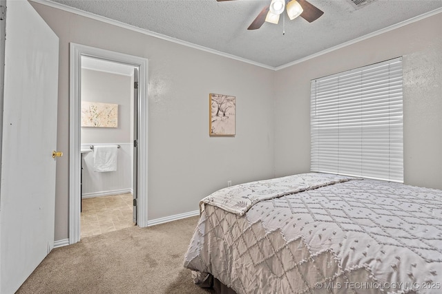 1015 NW Maxwell, Ardmore, OK 73401 - carpeted bedroom featuring a textured ceiling, ornamental molding, and a ceiling fan