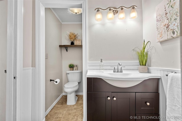 1015 NW Maxwell, Ardmore, OK 73401 - bathroom with vanity, crown molding, and stone finish flooring