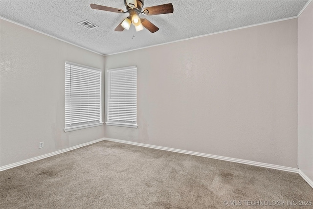 1015 NW Maxwell, Ardmore, OK 73401 - carpeted empty room featuring a textured ceiling, a ceiling fan, and crown molding