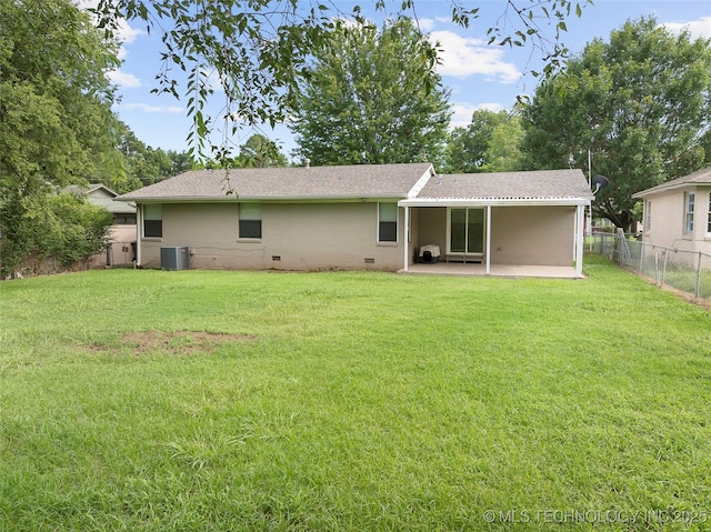 1015 NW Maxwell, Ardmore, OK 73401 - back of property with a patio area, crawl space, and a shingled roof