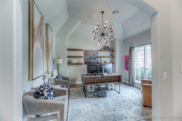 7349 E 119th Pl S, Bixby, OK 74008 - home office with a chandelier, arched walkways, lofted ceiling, and wood finished floors