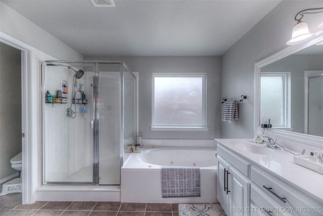 7349 E 119th Pl S, Bixby, OK 74008 - bathroom featuring vanity, a tub with jets, a stall shower, and tile patterned flooring