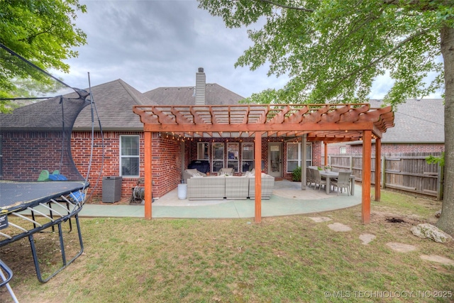 7349 E 119th Pl S, Bixby, OK 74008 - rear view of property featuring a pergola, brick siding, a chimney, an outdoor hangout area, and a patio