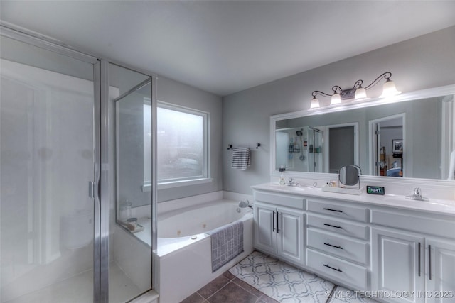 7349 E 119th Pl S, Bixby, OK 74008 - bathroom featuring a stall shower, a whirlpool tub, double vanity, and tile patterned floors