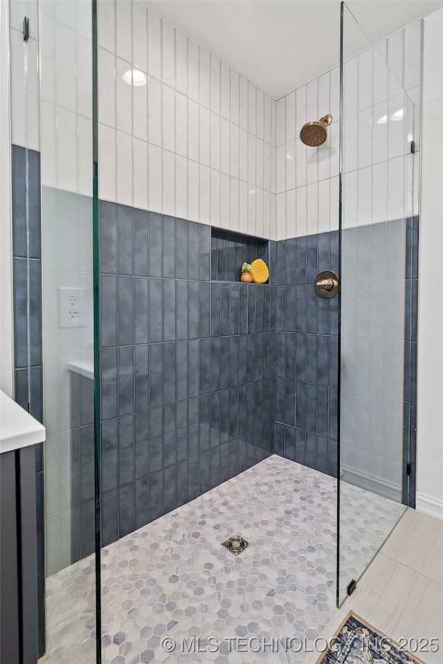 3039 W 69th Pl, Tulsa, OK 74132 - full bathroom with a tile shower and tile patterned flooring