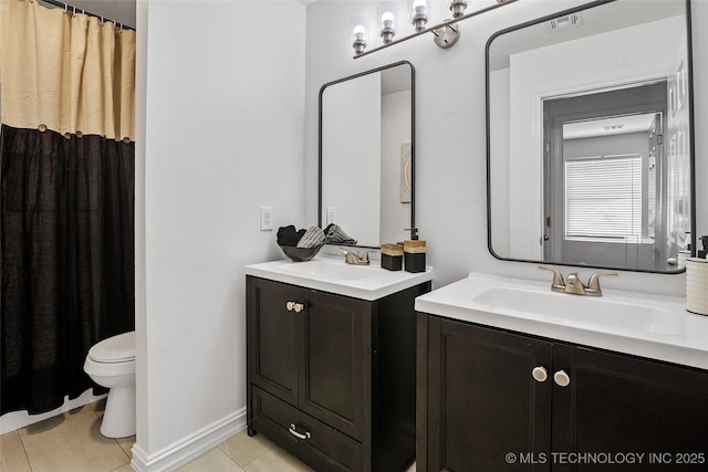 3039 W 69th Pl, Tulsa, OK 74132 - full bath featuring two vanities and tile patterned floors