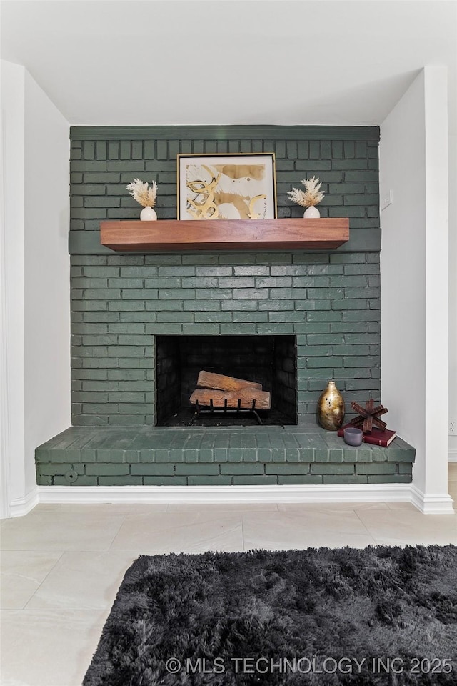 3039 W 69th Pl, Tulsa, OK 74132 - detailed view of a brick fireplace and baseboards