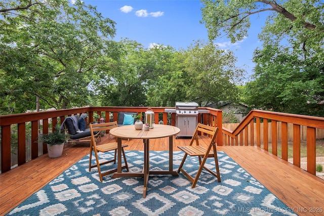 3039 W 69th Pl, Tulsa, OK 74132 - wooden deck with a grill and view of scattered trees