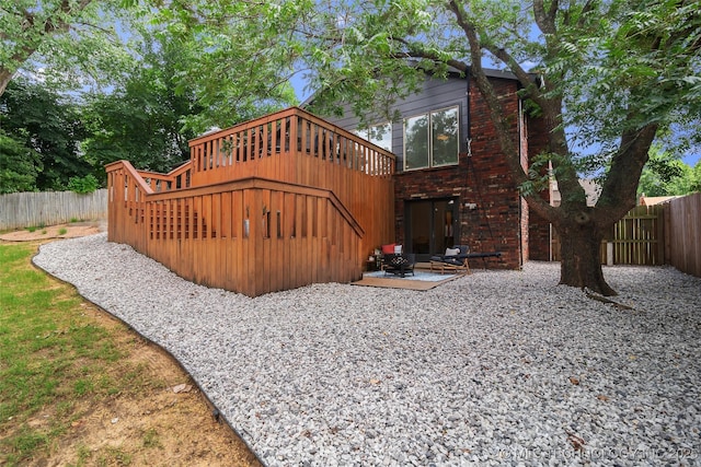 3039 W 69th Pl, Tulsa, OK 74132 - rear view of house featuring a fenced backyard and a patio area