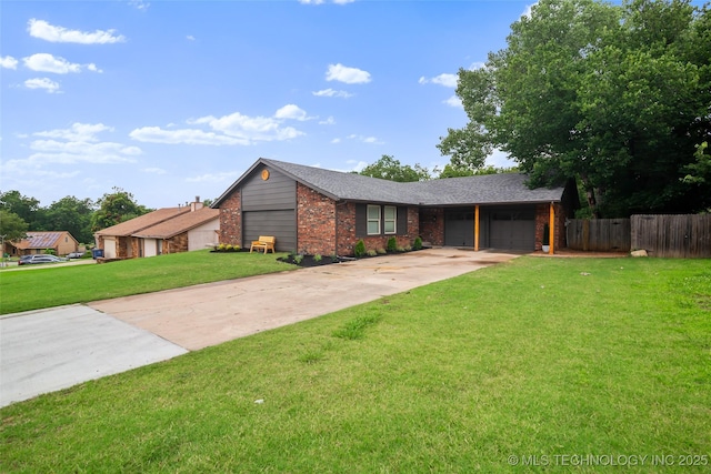 3039 W 69th Pl, Tulsa, OK 74132 - view of front of house featuring brick siding, a garage, and driveway