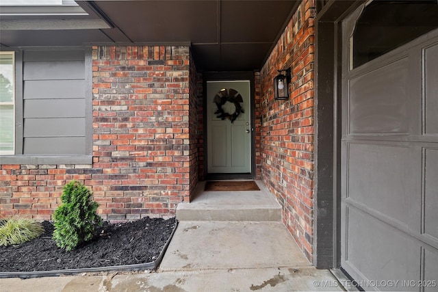 3039 W 69th Pl, Tulsa, OK 74132 - doorway to property featuring brick siding