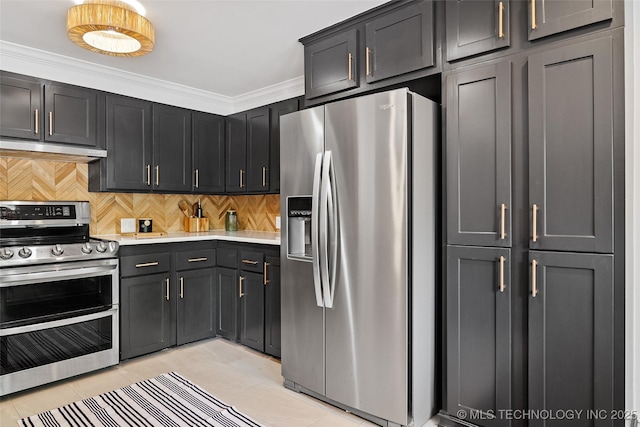 3039 W 69th Pl, Tulsa, OK 74132 - kitchen featuring appliances with stainless steel finishes, under cabinet range hood, decorative backsplash, light countertops, and light tile patterned floors