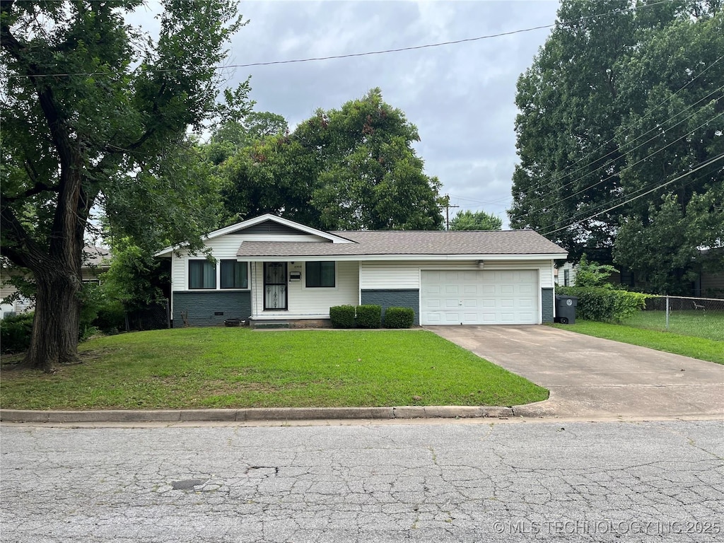 4908 N Xanthus Ave, Tulsa, OK 74130 - view of front of house with a garage, concrete driveway, and crawl space